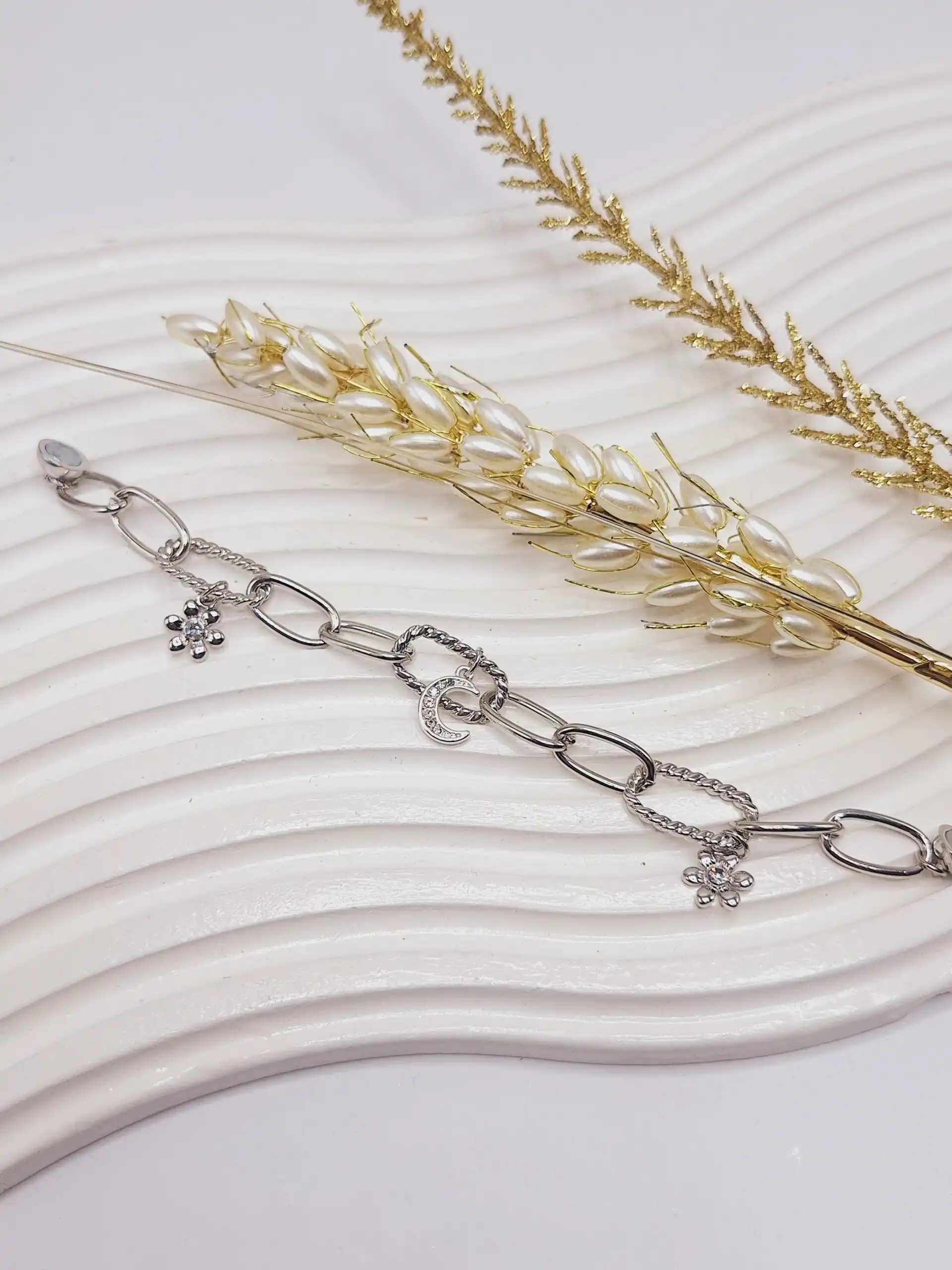 دستبند ترند طنابی طرح گل نقره ای